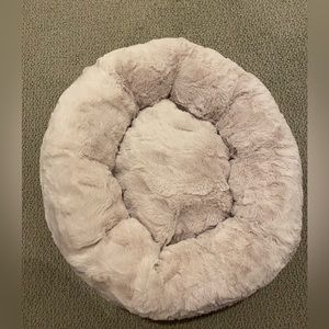 Fringe never been used dog bed